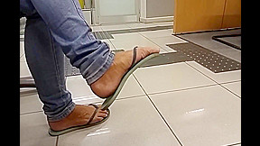 Amateur flip-flop dangling on bank