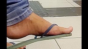 Amateur flip-flop dangling on bank