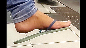 Amateur flip-flop dangling on bank