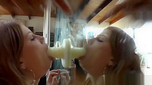 Amazing babes gagging on big dildo