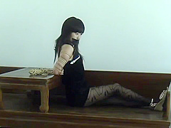 Asian Girl Tied In Black Dress