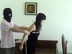Asian Girl Tied In Black Dress
