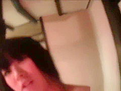 Asian lesbian rubs pussy