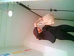 Asian redhead woman spied peeing