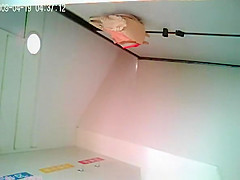 Asian redhead woman spied peeing