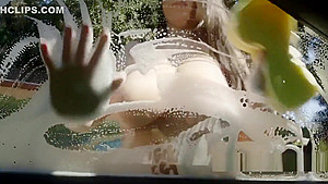 Babe washing car with huge boobs out outdoor