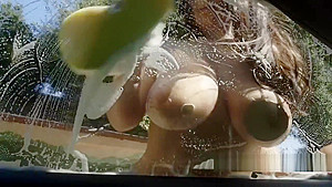 Babe washing car with huge boobs out outdoor