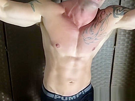 Bound muscular dude endures tickling from a mature deviant