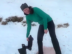 Brave Russian woman swims in the ice-cold water