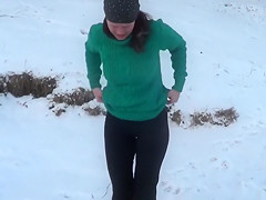 Brave Russian woman swims in the ice-cold water