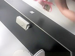 Brunette girl pulling down her bikini bottom and pissing