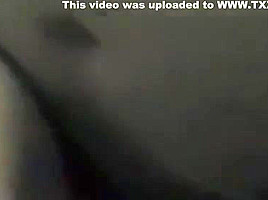 Brunette milf sucks a black cock while getting fucked from behind