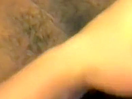 Brunette milf sucks a black cock while getting fucked from behind