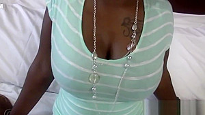 Busty black babe sucking