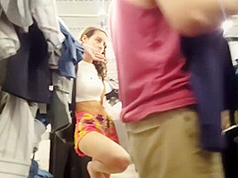 Candid nice feet hottie holding thongs shopping with bf