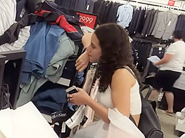 Candid nice feet hottie holding thongs shopping with bf