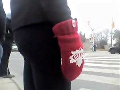 Candid street booty wrapped into tight pants on a cool day