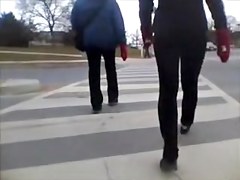 Candid street booty wrapped into tight pants on a cool day