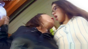 Classy asian and european babes deepthroating and cumswapping