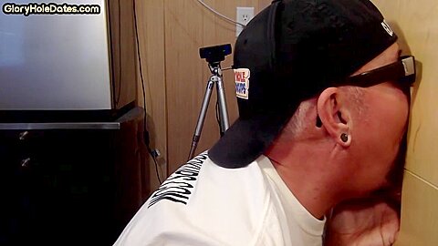 Cockhungry gloryhole DILF sucks penis in homemade video