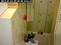 Cute Asian girl changes in the locker room