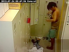 Cute Asian girl changes in the locker room
