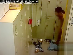 Cute Asian girl changes in the locker room