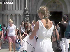Cute girl in a white summer dress