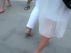 Cute girl in a white summer dress