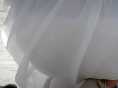 Cute girl in a white summer dress