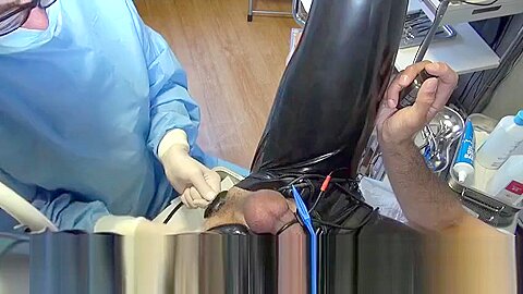 Doctor Fists and Sounds Latex Slave with Gloves in Gyno Chair