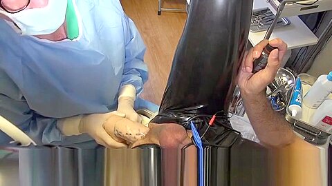Doctor Fists and Sounds Latex Slave with Gloves in Gyno Chair