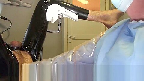 Doctor Fists and Sounds Latex Slave with Gloves in Gyno Chair
