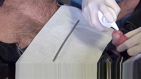 Doctor Fists and Sounds Latex Slave with Gloves in Gyno Chair