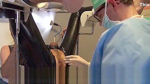 Doctor Fists and Sounds Latex Slave with Gloves in Gyno Chair