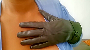Ebony Girl In Biker Gloves Sucks A Dildo Passionately For You