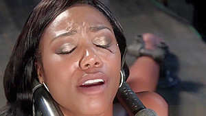 Ebony sub in different device bondage