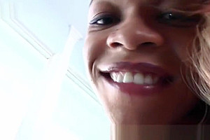 Ebony tranny in fishnet strips and jerks her big black cock