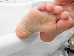 Foot Model Photography Bathroom Shot Playing With Wet Lube