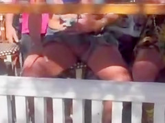 German ladies at the bar show their shaved cunts