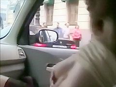 Girl flashes in moving car