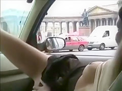 Girl flashes in moving car