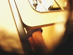 Girl in a dressing room puts on tiny top and candid shorts