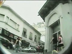 Girl in flip-flops shows her ass on the candid camera