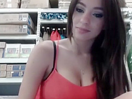 Girl with laptop masturbating in a big store