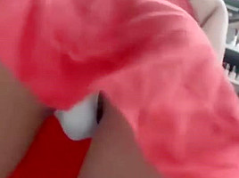 Girl with laptop masturbating in a big store