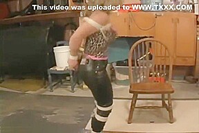 Girl with leather-pants bound and ballgagged