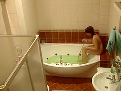 Girl's masturbation spied in a jacuzzi