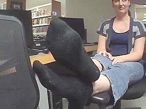 Girls feet in the library
