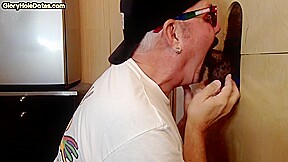 Gloryhole mature DILF blowing and tugging black cock